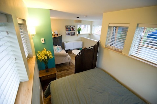 Bedroom and Living Area in the Loft of Small Home
