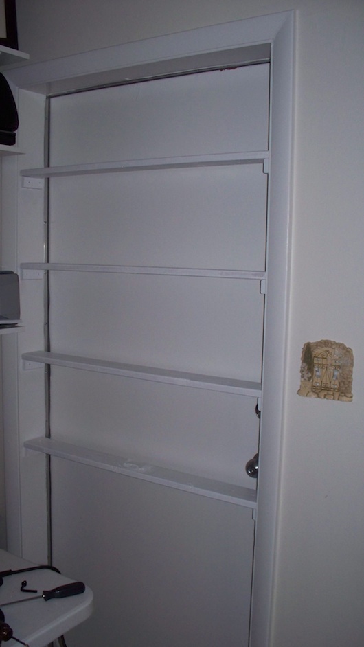 Door to bookshelf