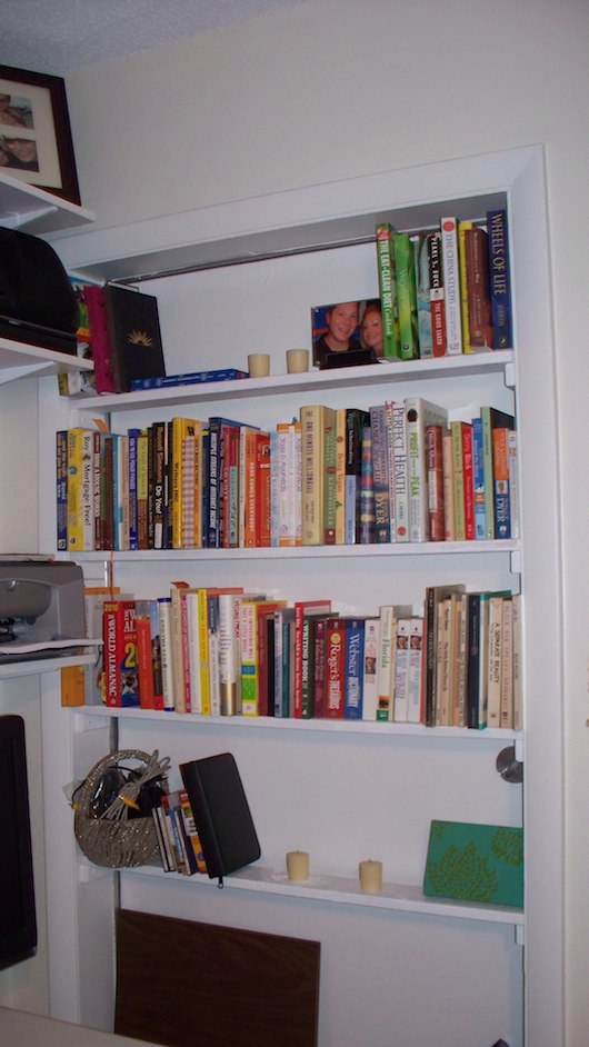 Door turned into built in book shelf