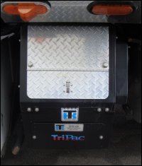 An auxiliary power unit or APU installed on a large truck.