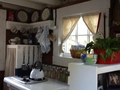 Kitchen with closet at window